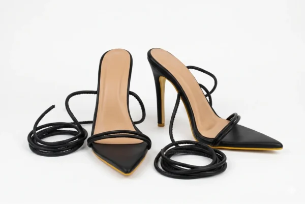 Solace Heels – Black Faux Leather Pointed Toe Lace-Up Stilettos with Gold Accents